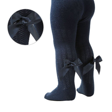 Navy blue chevron pattern tights with large blue bows on a white background