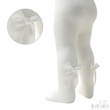 Cream chevron design tights with bow details on a white background