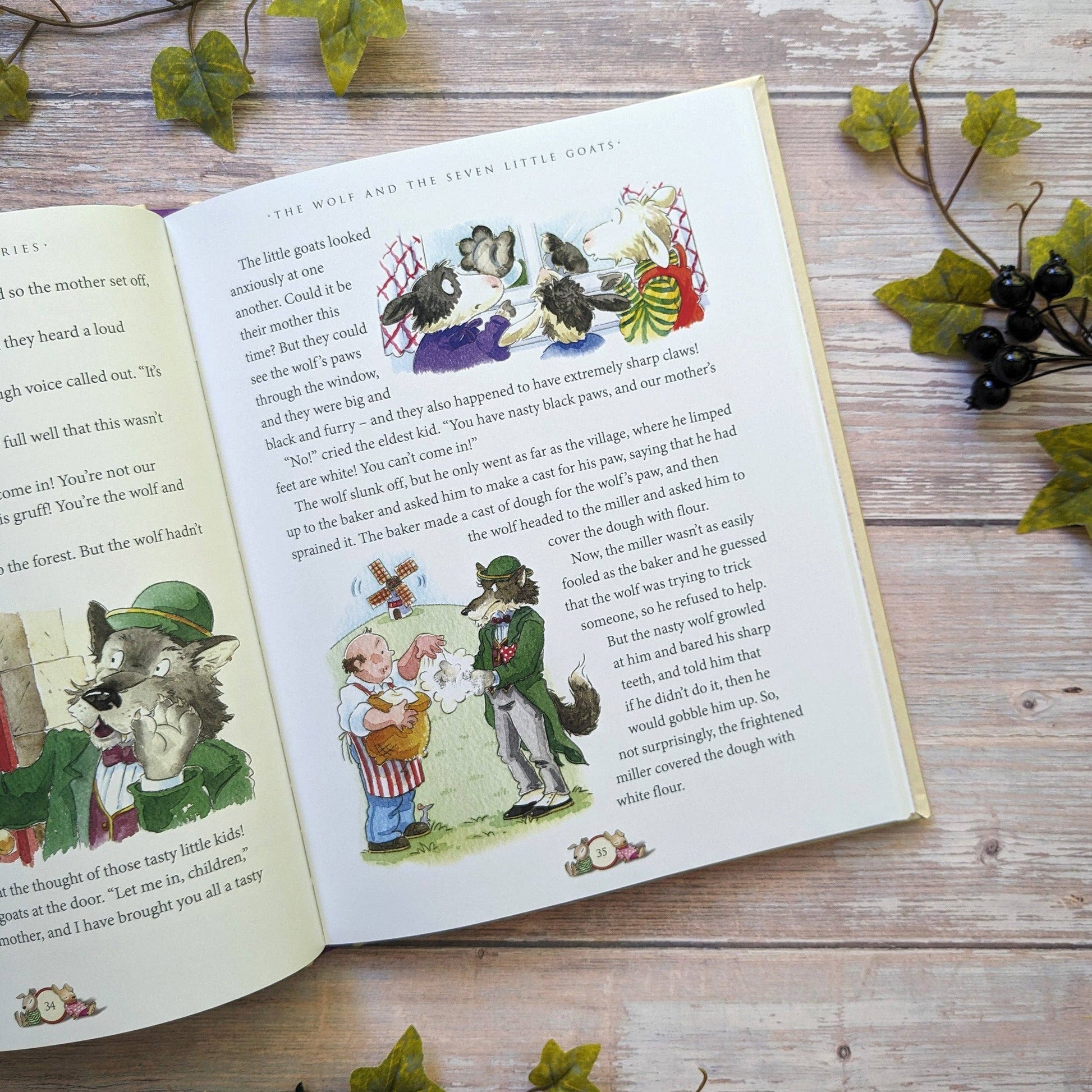 Open book with illustrated fairy tale pages on a wooden surface with decorative elements.