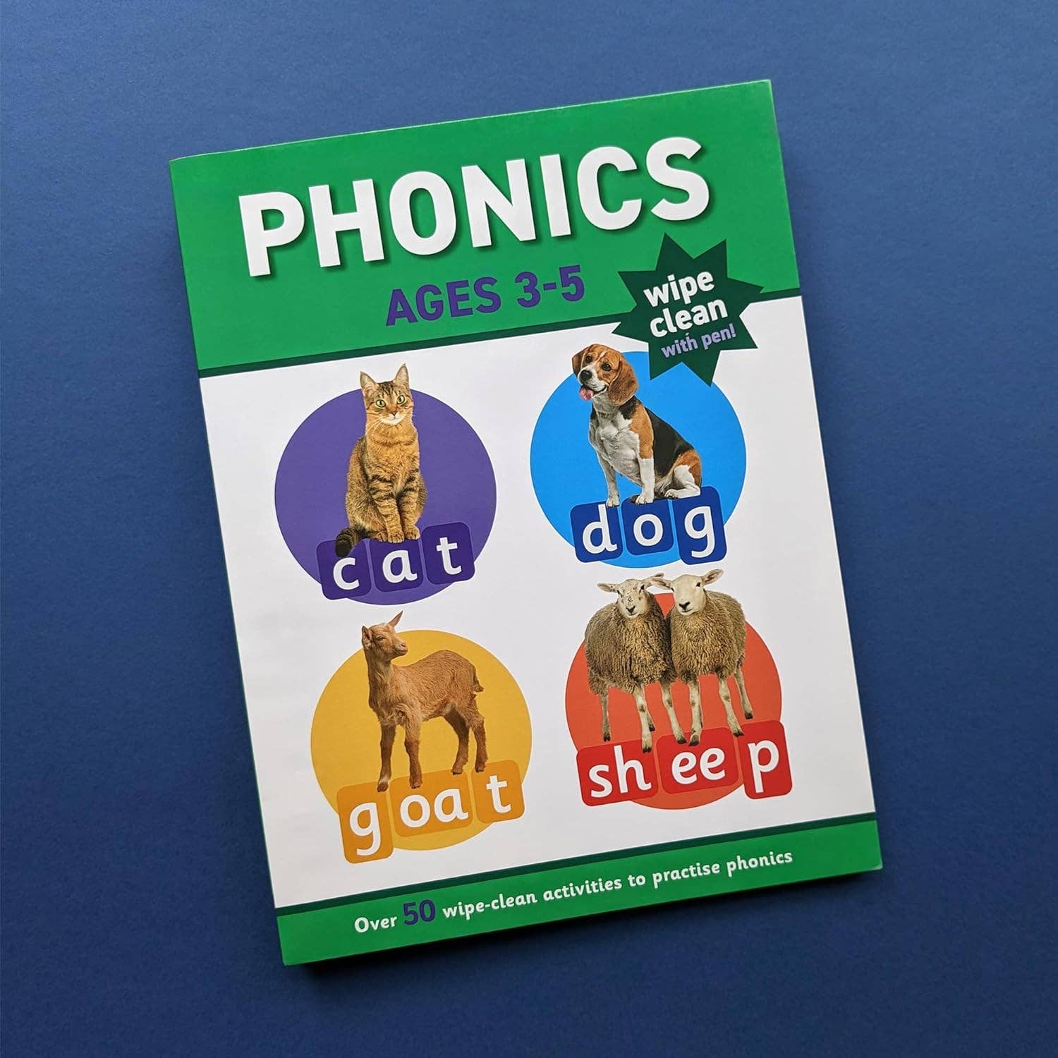 Phonics book for ages 3-5 with animal illustrations on a blue background