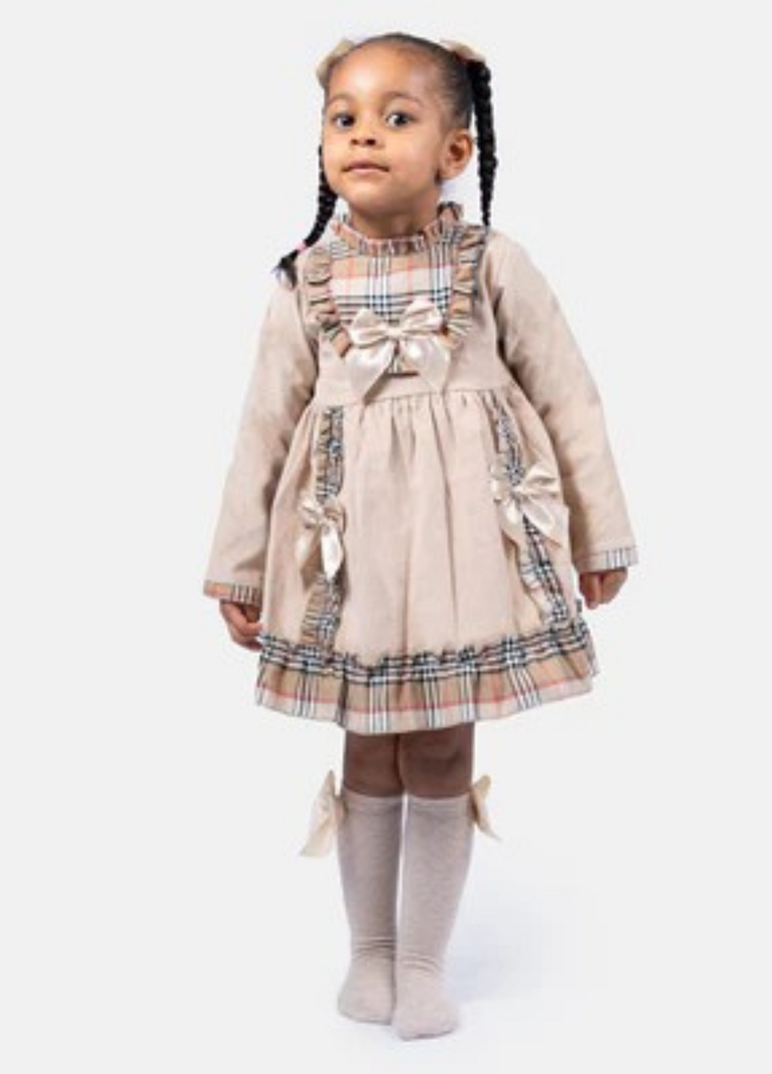Girls Spanish Beige dress with plaid accents and large bows and frills 