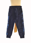 Navy blue jogger pants with blue camo side panels on a white background
