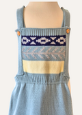 Close up of the boys spanish knitted short rompers bib area
