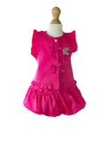Pink top and skirt on a mannequin with a white background