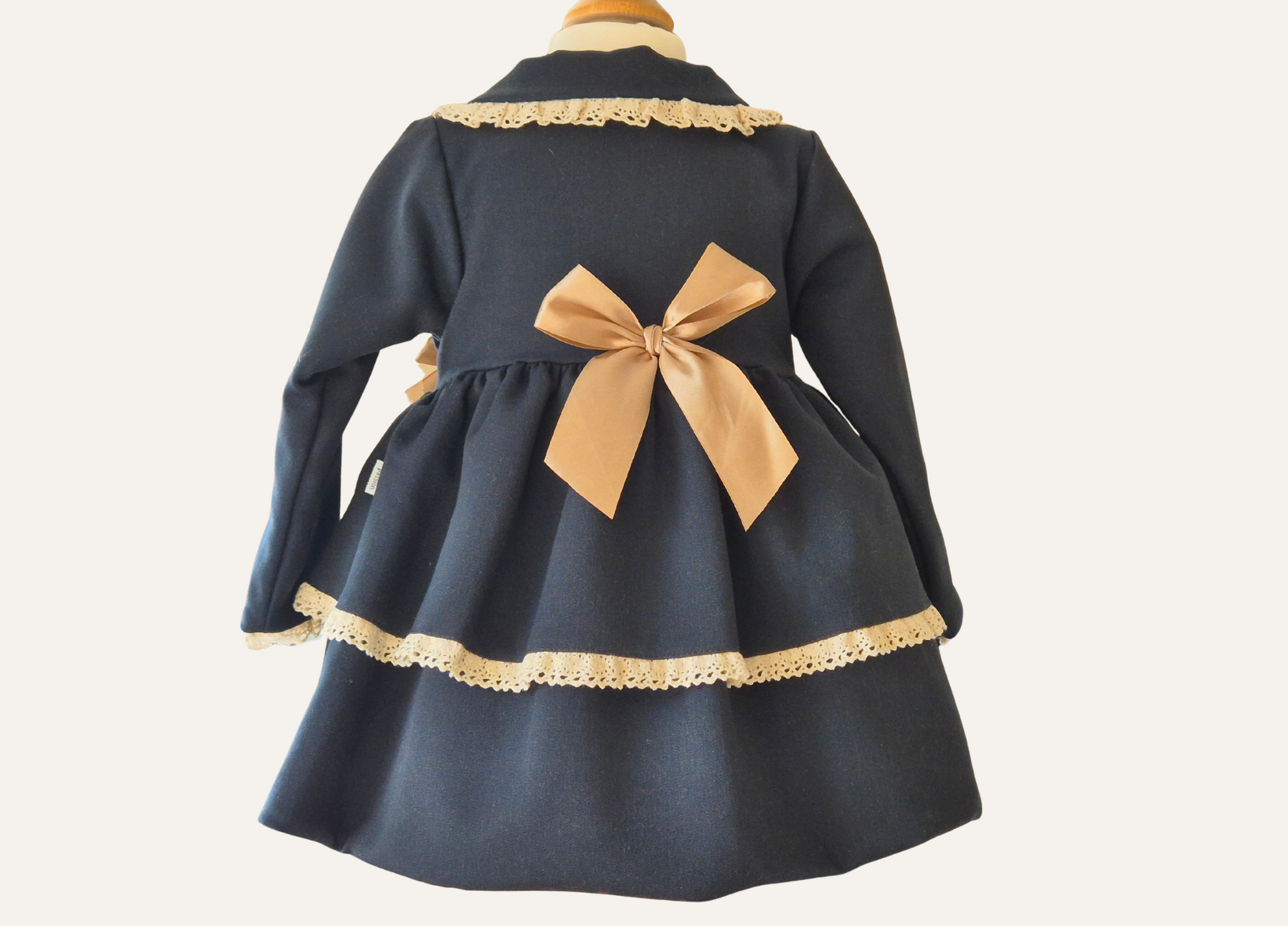 Girls Navy Blue and beige lace trim with bow spanish coat close up back view