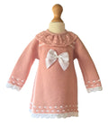 Dusky pink knitted baby dress with  lace knit collar and satin bow