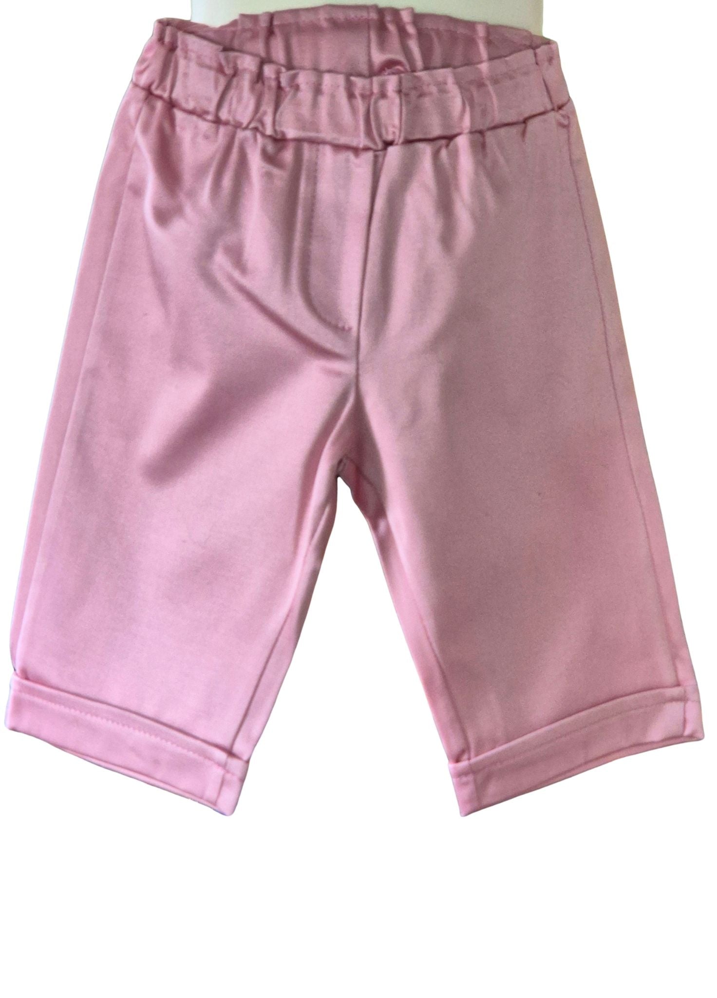 Girls dusky pink knee length shorts part of a two piece summer outfit.