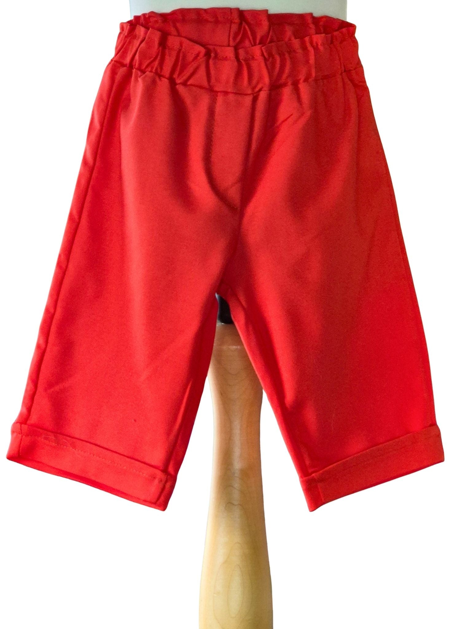 Girls holiday outfit with red shorts and floral blouse