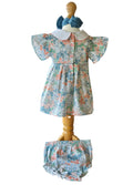 back of a baby girl floral occasion dress with peter pan collar