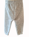 Pair of grey joggers that belong to the 2 piece set on a white background
