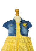 Yellow lace dress with a blue denim shrug on a mannequin against a white background