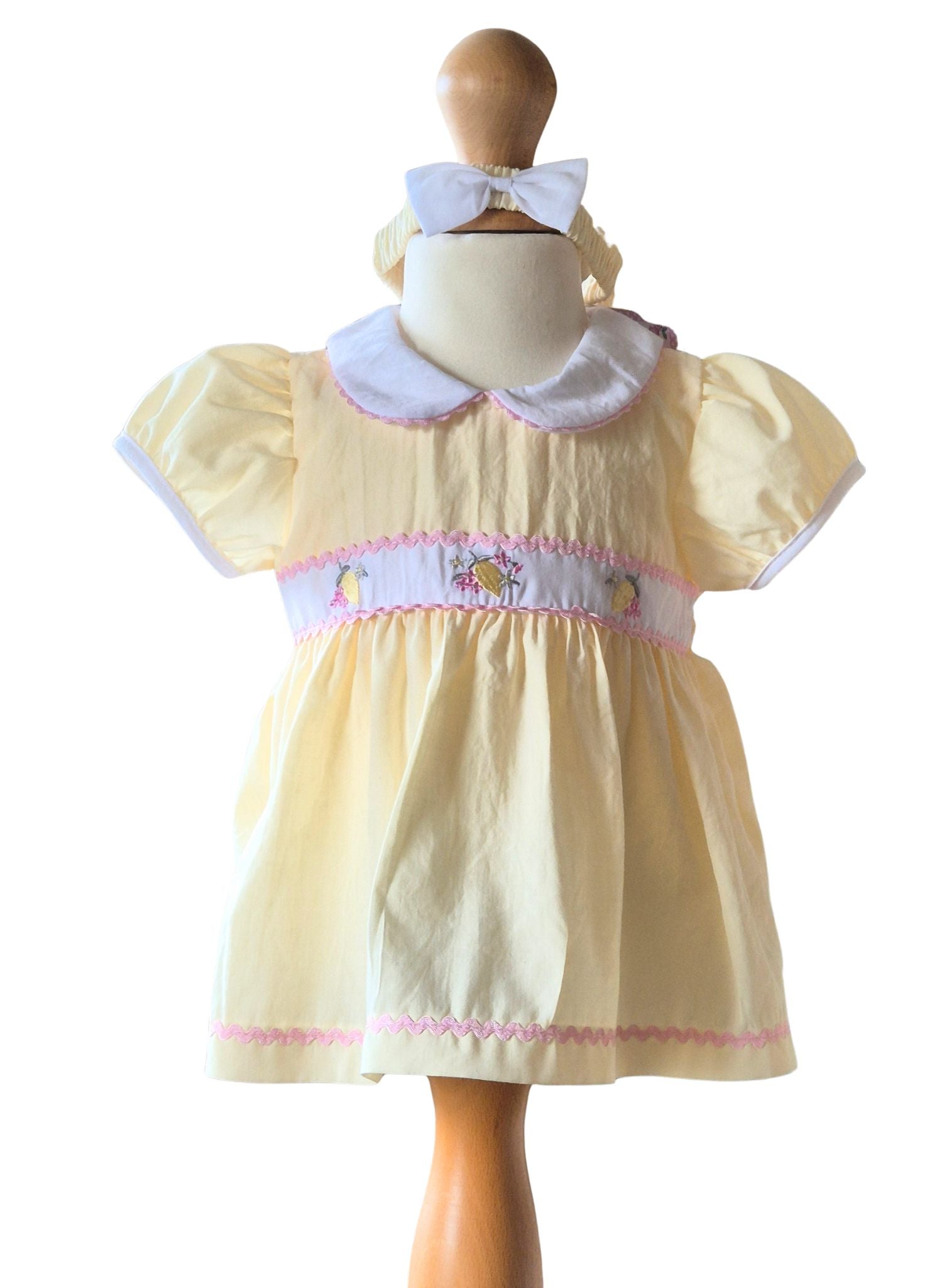 lemon baby dress with embroidered lemons and puff sleeves
