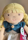 Organic  ragdoll with blonde hair and blue clothing, wearing a Tikiri tag.