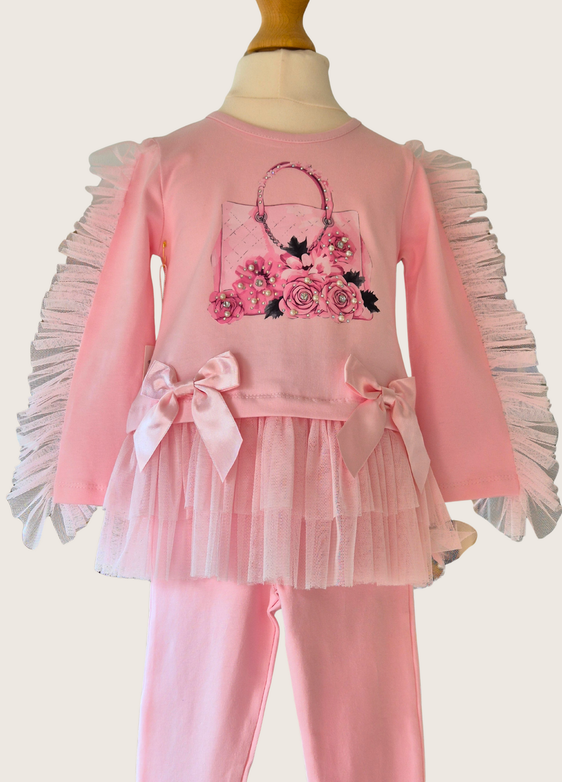 Girls Pink frilly leggings and long sleeved top featuring a handbag design from Neon Kids