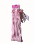 Pink knee high socks with heart pattern and bow on a white background
