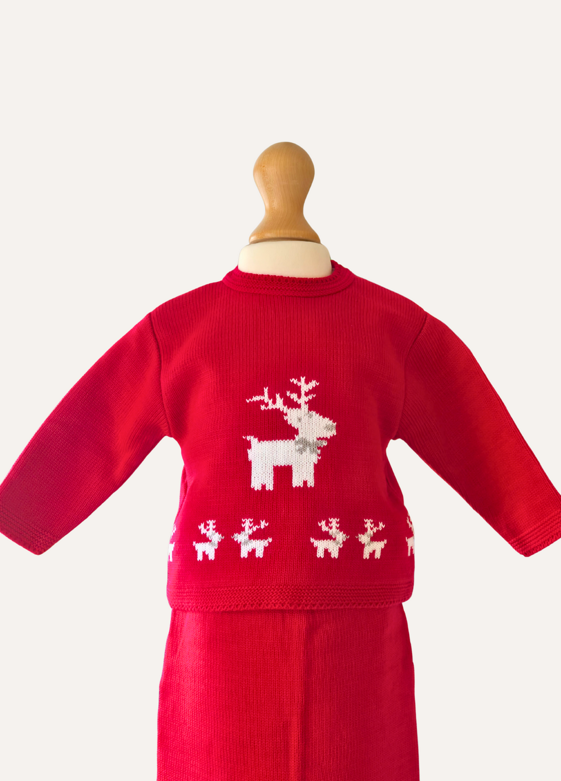 Knitted unisex baby red outfit with white reindeer design from Dandelion