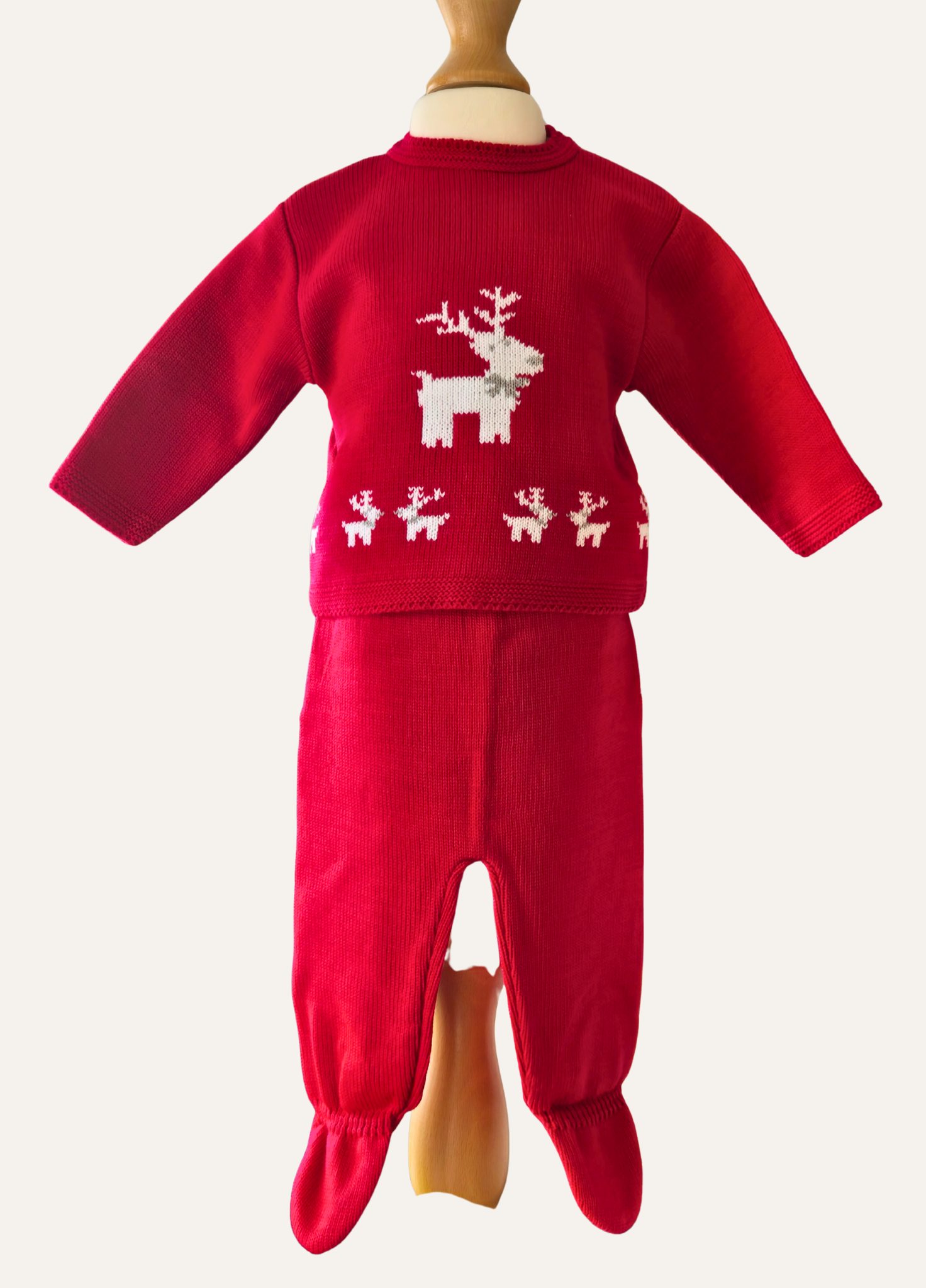 Knitted unisex baby red outfit with white reindeer design from Dandelion