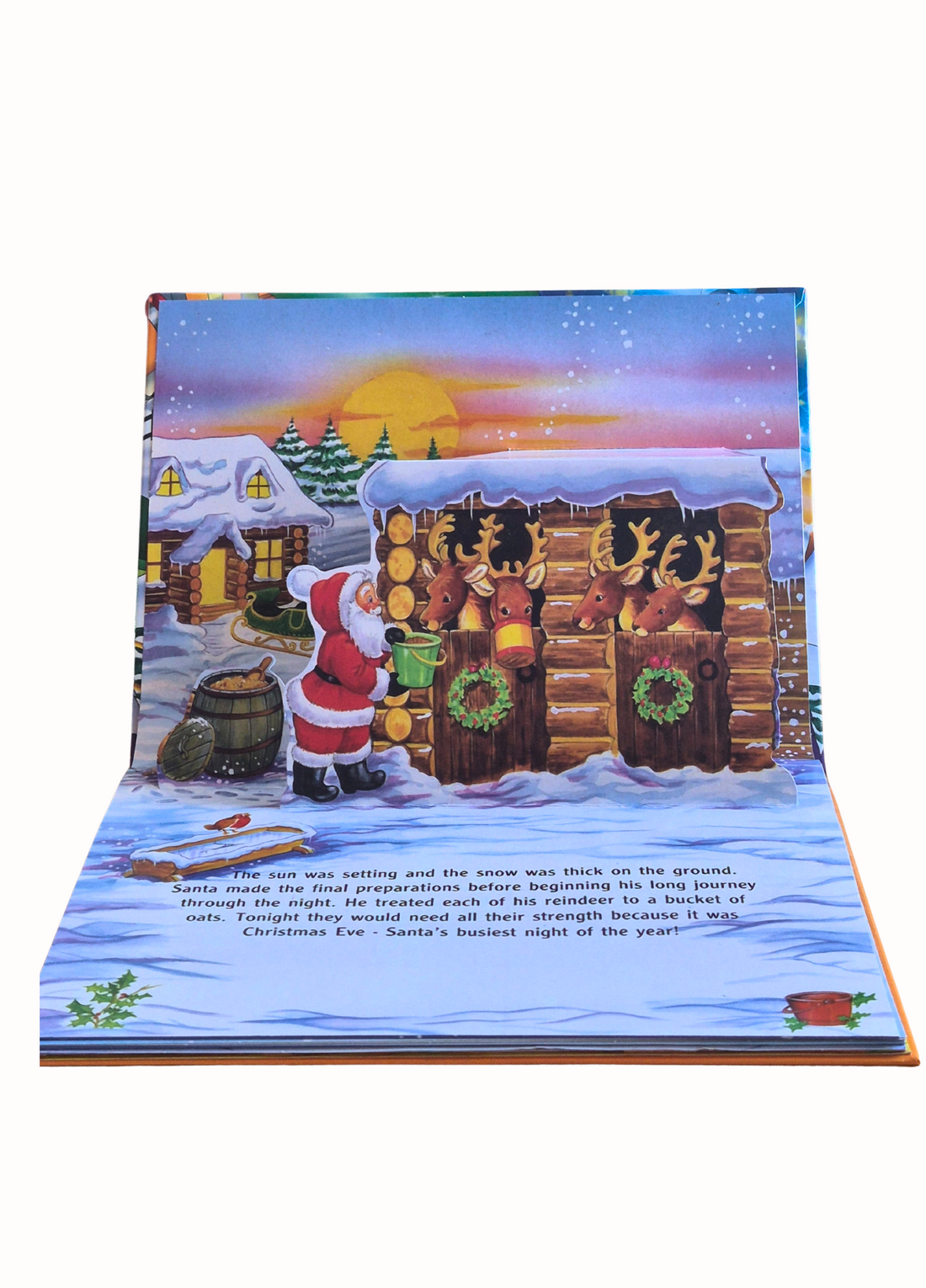 Pop-up storybook cover featuring Santa Claus in a sleigh with a snowy landscape.