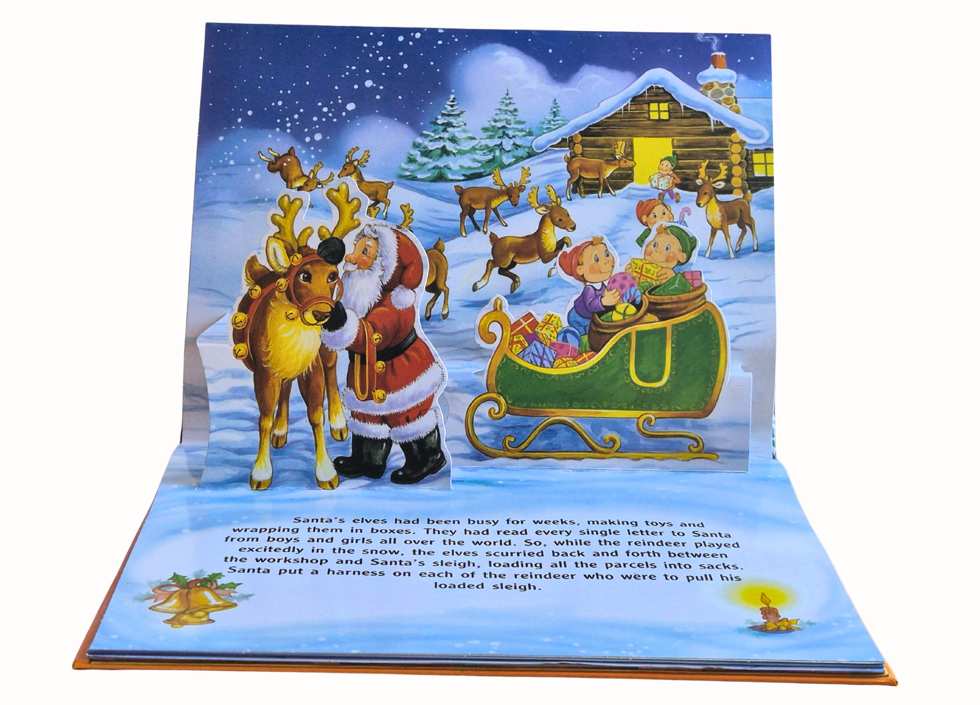 Pop-up book page with Santa Claus and reindeer in a snowy scene