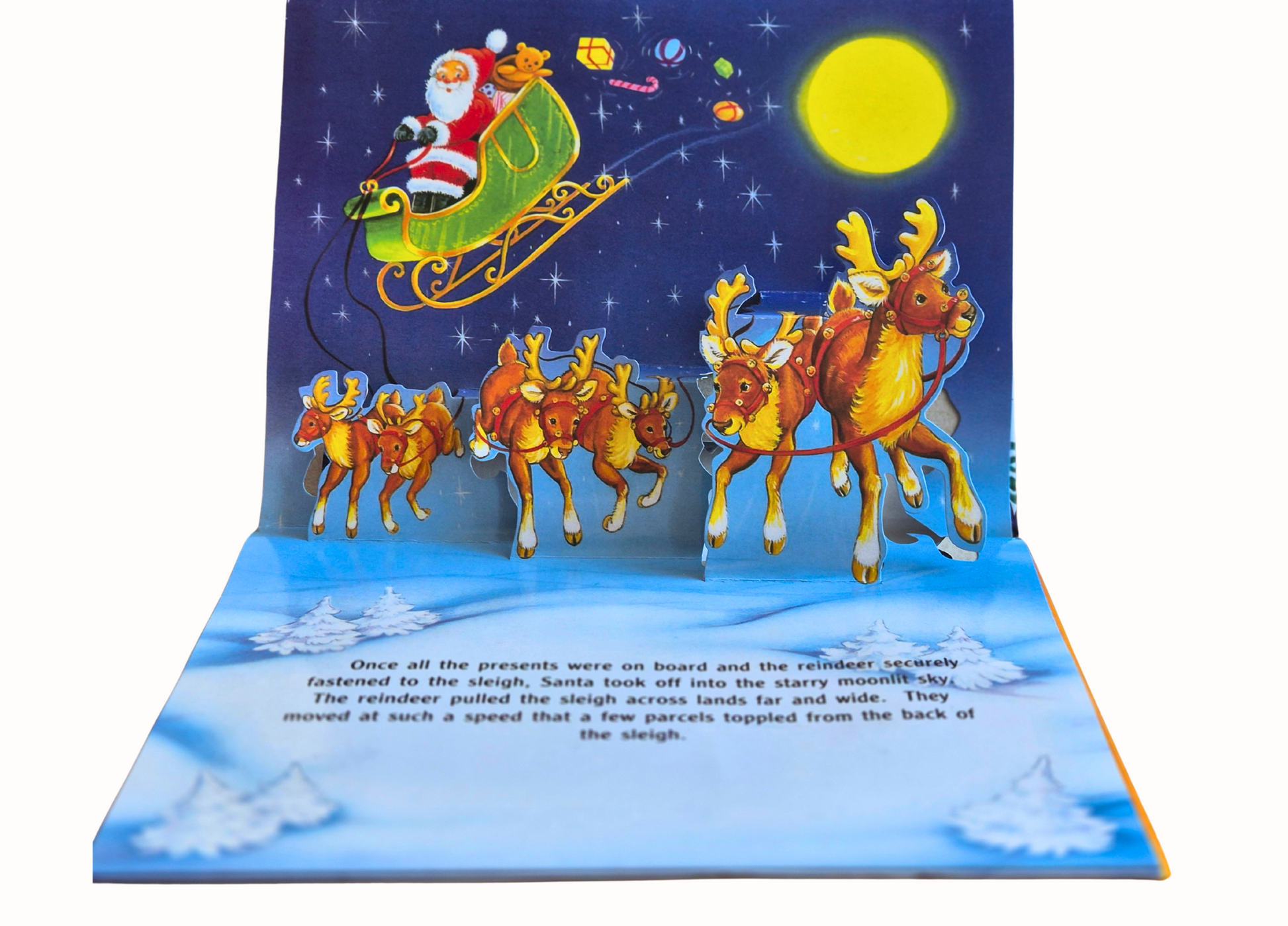 Pop-up Christmas book with Santa Claus and reindeer sleigh against a starry night sky.