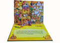 Pop-up book with toy-themed illustrations and text on a white background