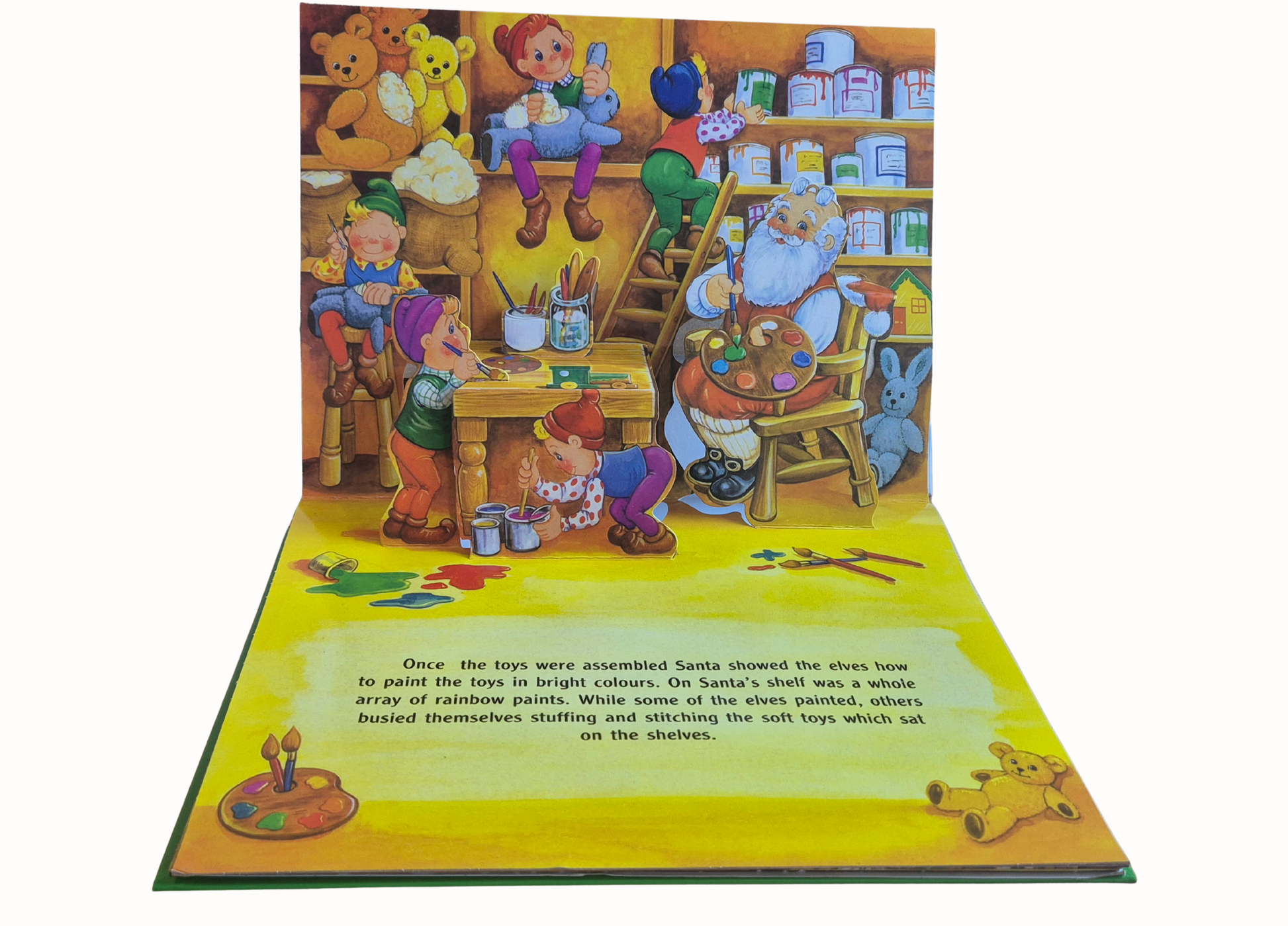 Pop-up book with toy-themed illustrations and text on a white background