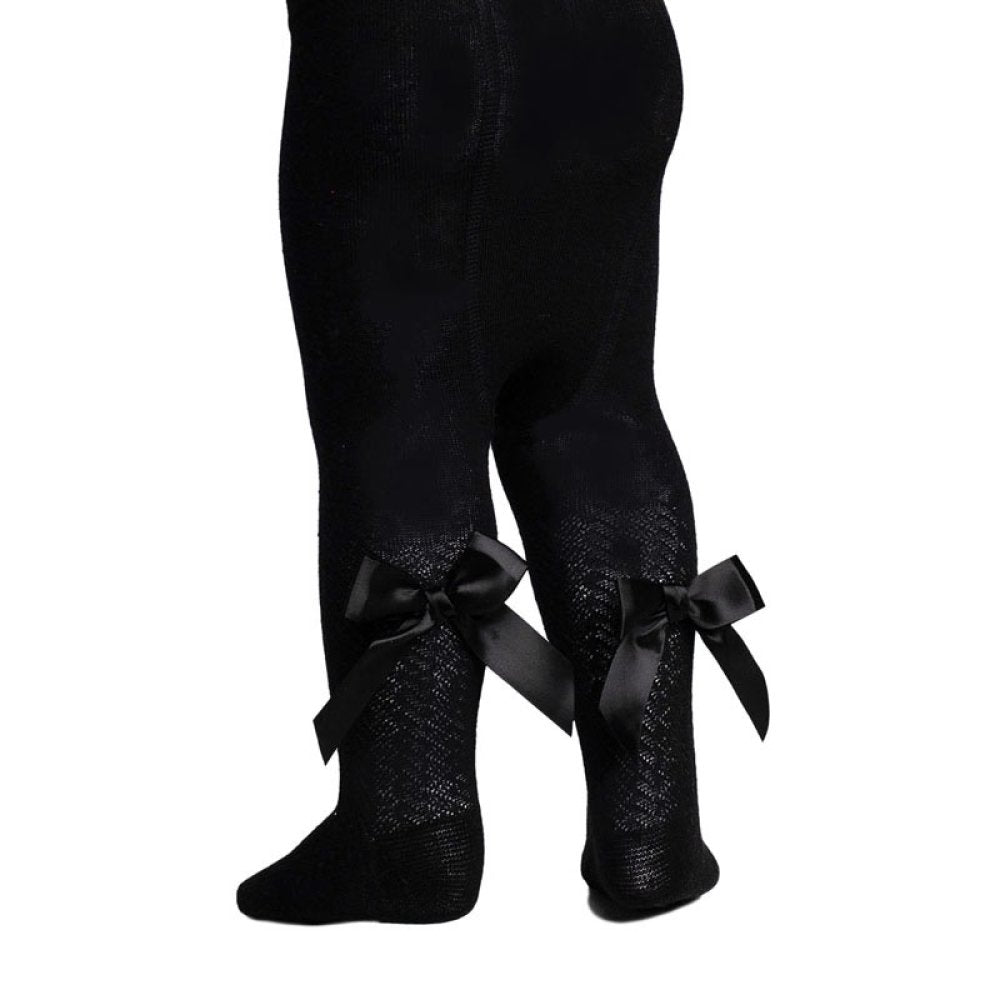 Black chevron tights with decorative bows on a white background