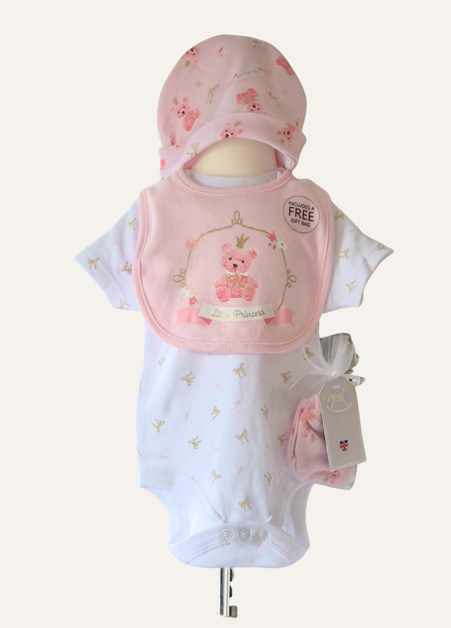Baby Girls Teddy Princess white vest, pink hat and mittens and bib from the 5 piece Rock A Bye Baby set