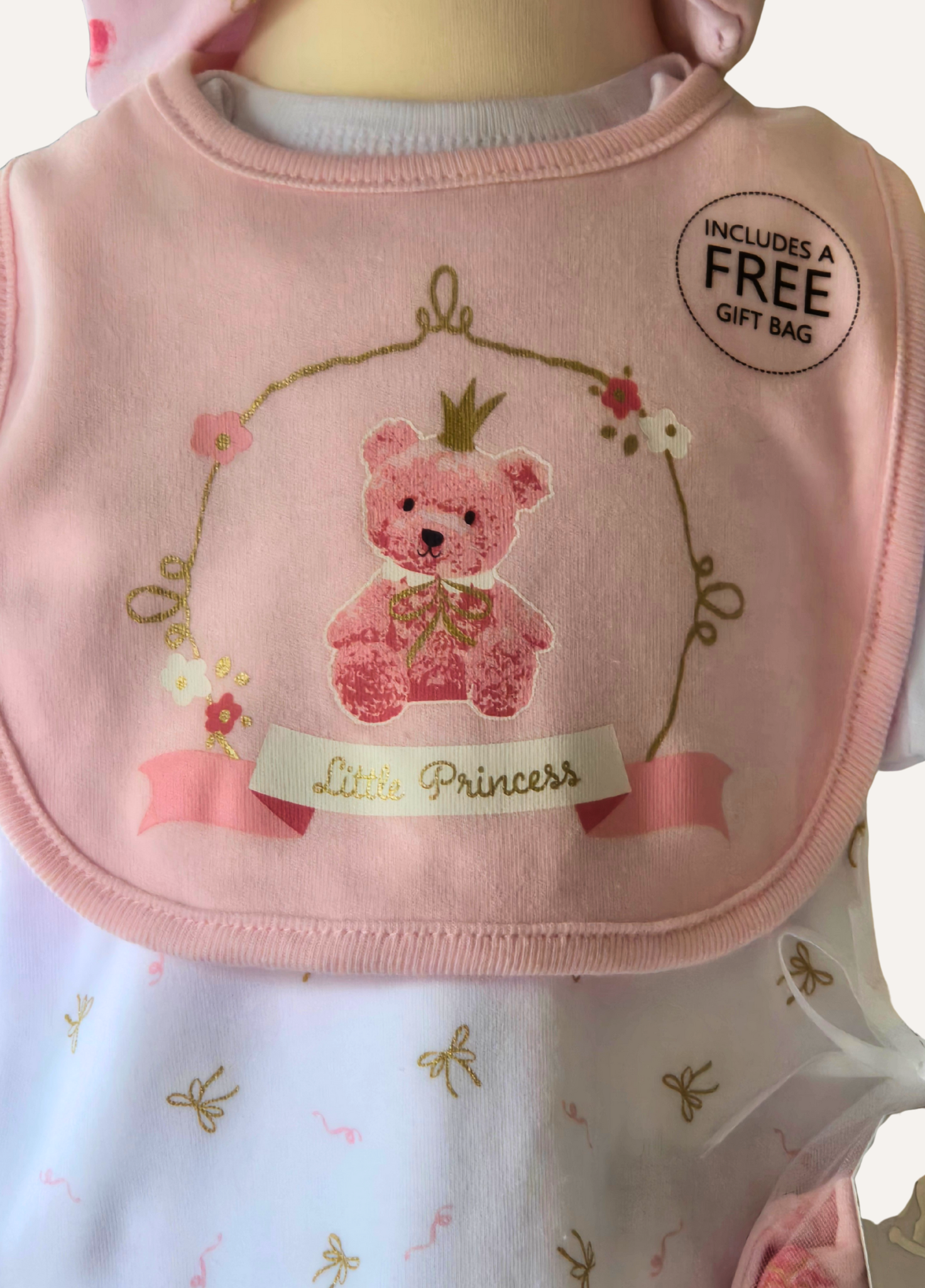 Close up of the pink baby girls teddy princess bib part of the 5 piece set from Rock A Bye Baby