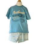 Children's blue t-shirt with text and shorts on a mannequin against a white background