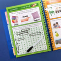 Educational book with a worksheet on a blue background