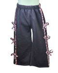 Girls black flared trousers with animal print bows