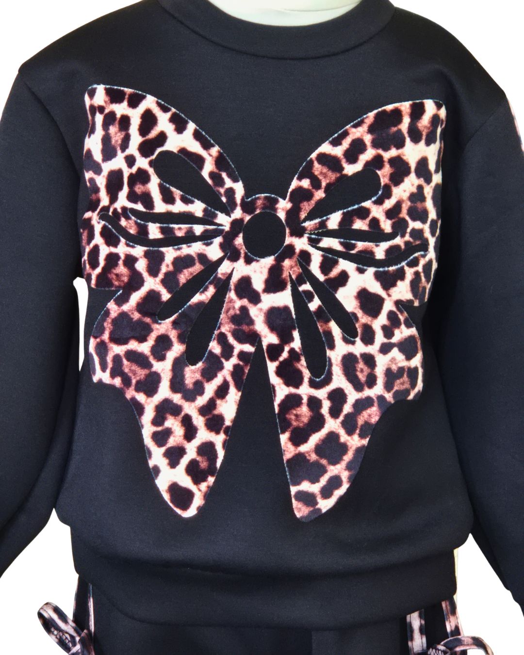 Girls black leisure suit with statement animal print bow