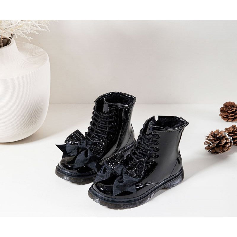 Pair of girls black patent boots with sparkly bows on the front