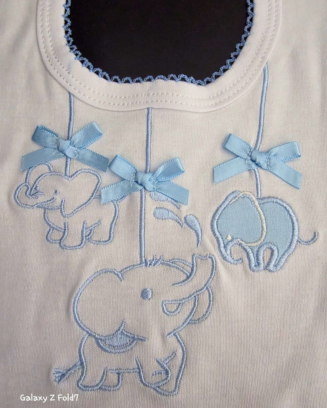 Blue elephant bib with Velcro fastening