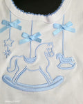 Blue rocking horse bib with Velcro fastening