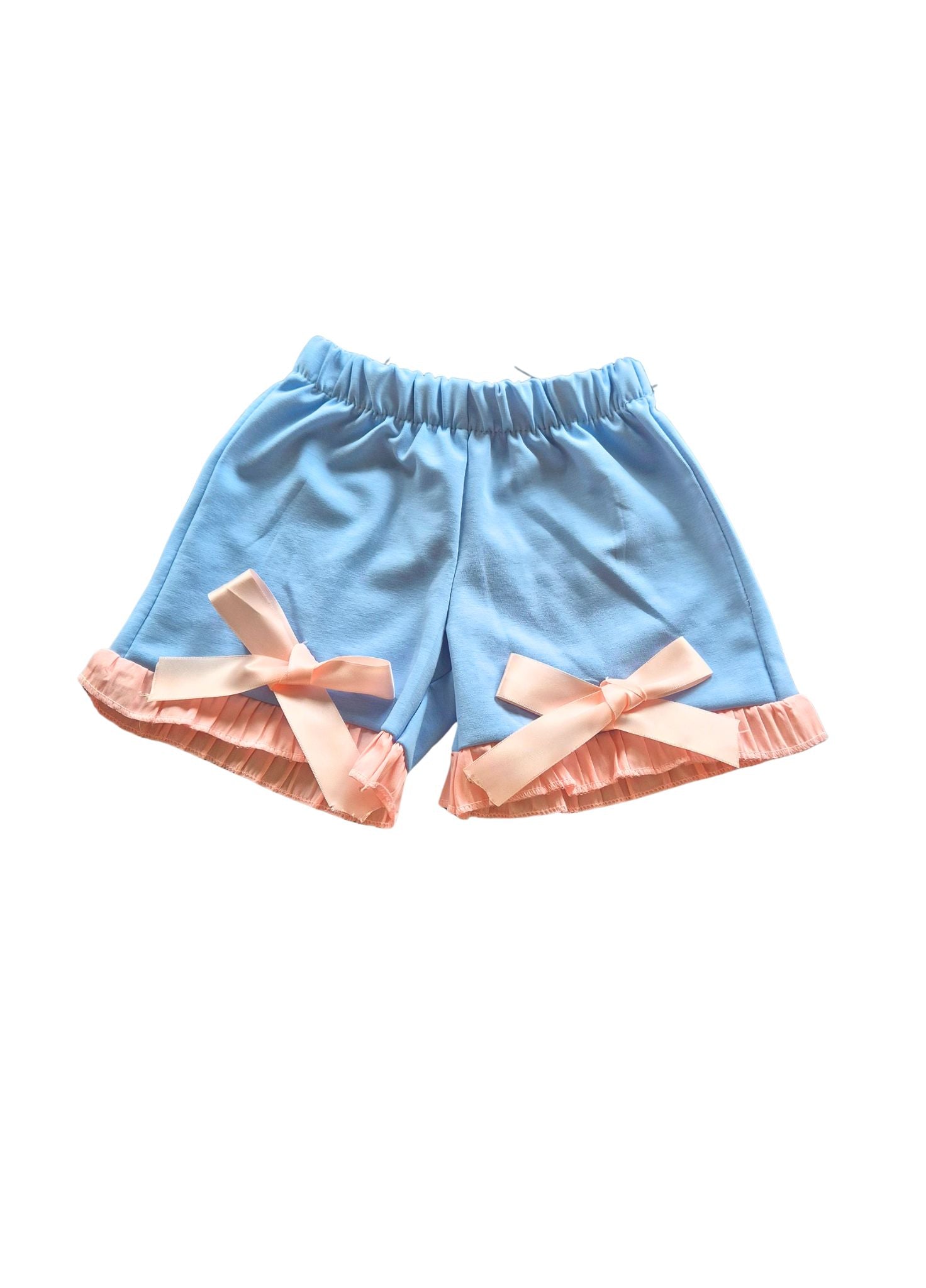 Light blue shorts with pink bows on a white background