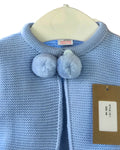 Baby blue knitted cardigan with decorative pom poms