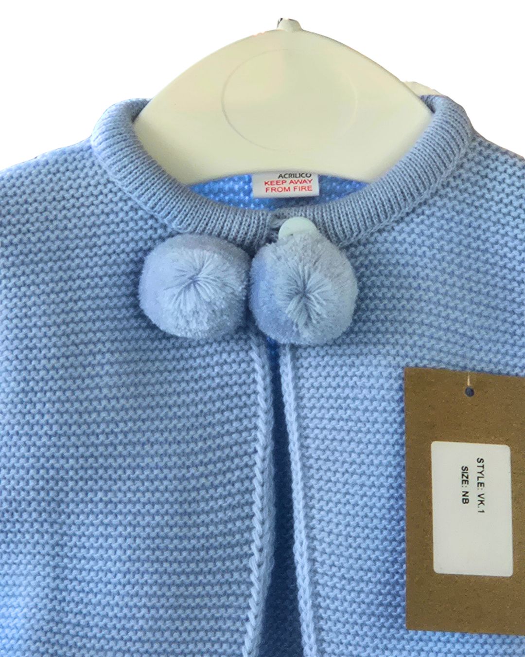 Baby blue knitted cardigan with decorative pom poms