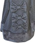 Blue girls party dress with sparkle bows and fluffy hem