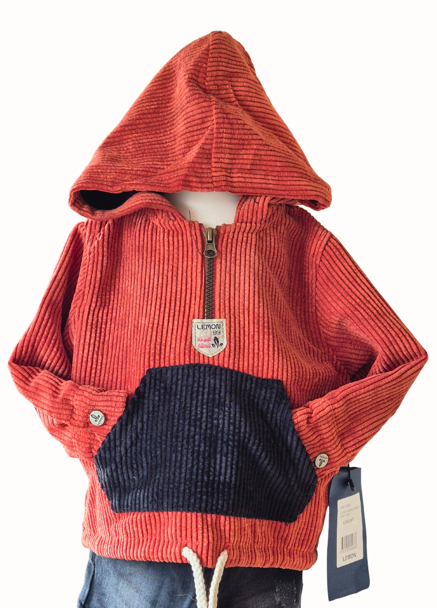 Rust corduroy hoodie with black pocket on a white background