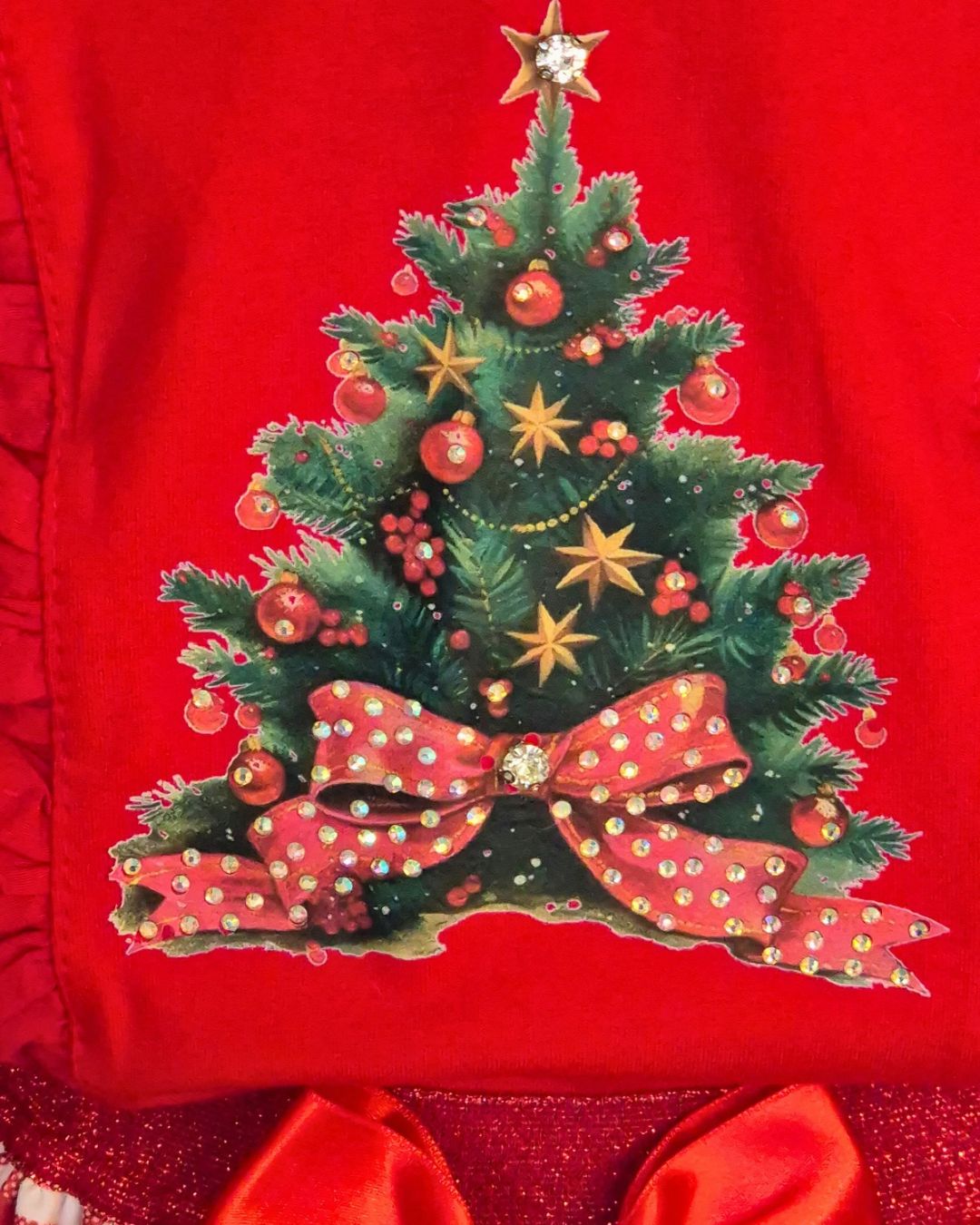 Girls’ long-sleeved Christmas top with frill details