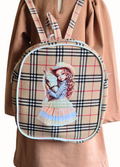 Plaid backpack with a design of a girl holding a horse on a plain background