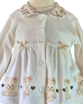 Cream swing jacket with teddy bear print for baby girls