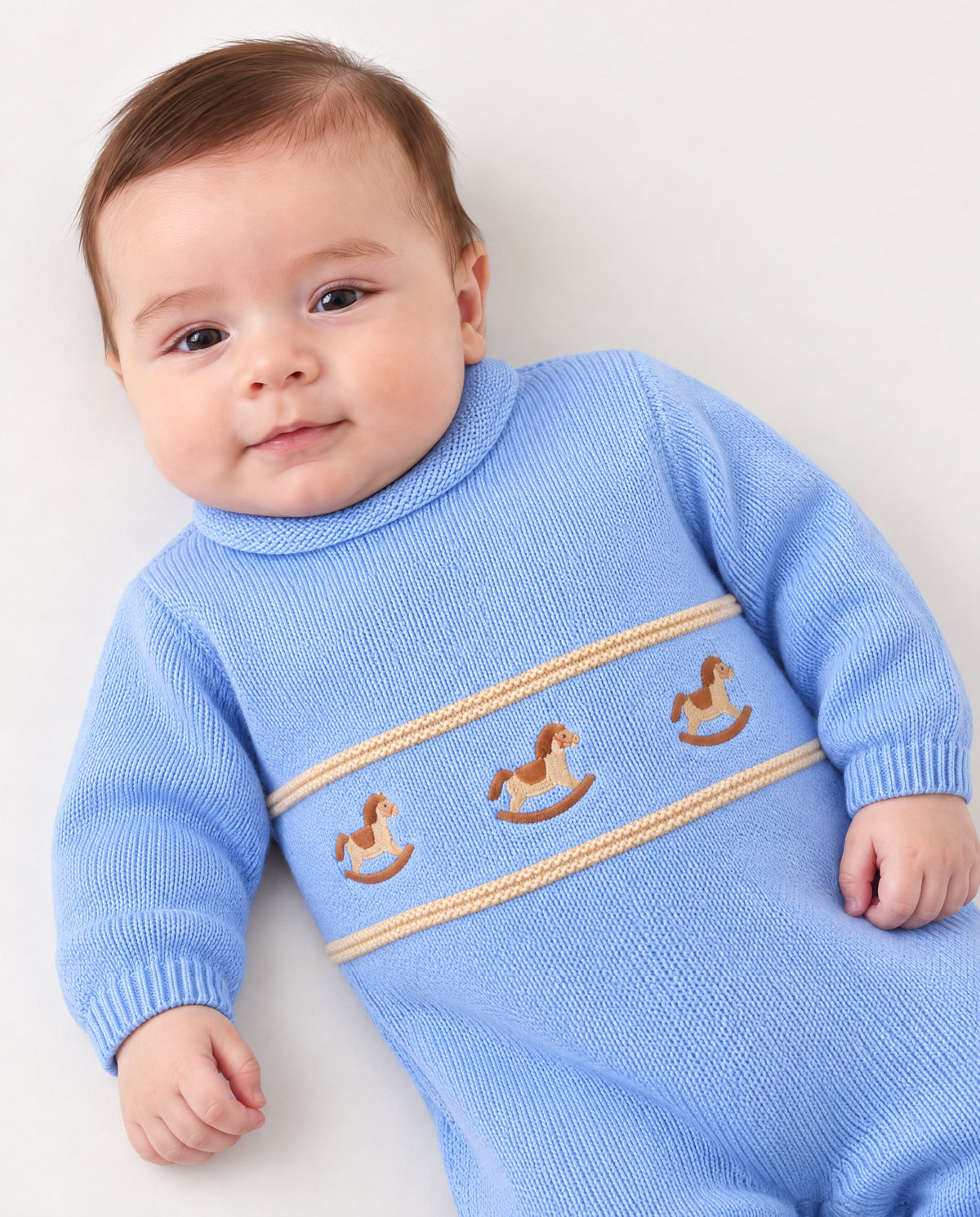 Baby boys’ blue romper with beige rocking horse embroidery