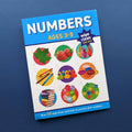 Book titled 'Numbers Ages 3-5' with colorful illustrations on a blue background