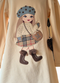 Close up of the doll in the dress