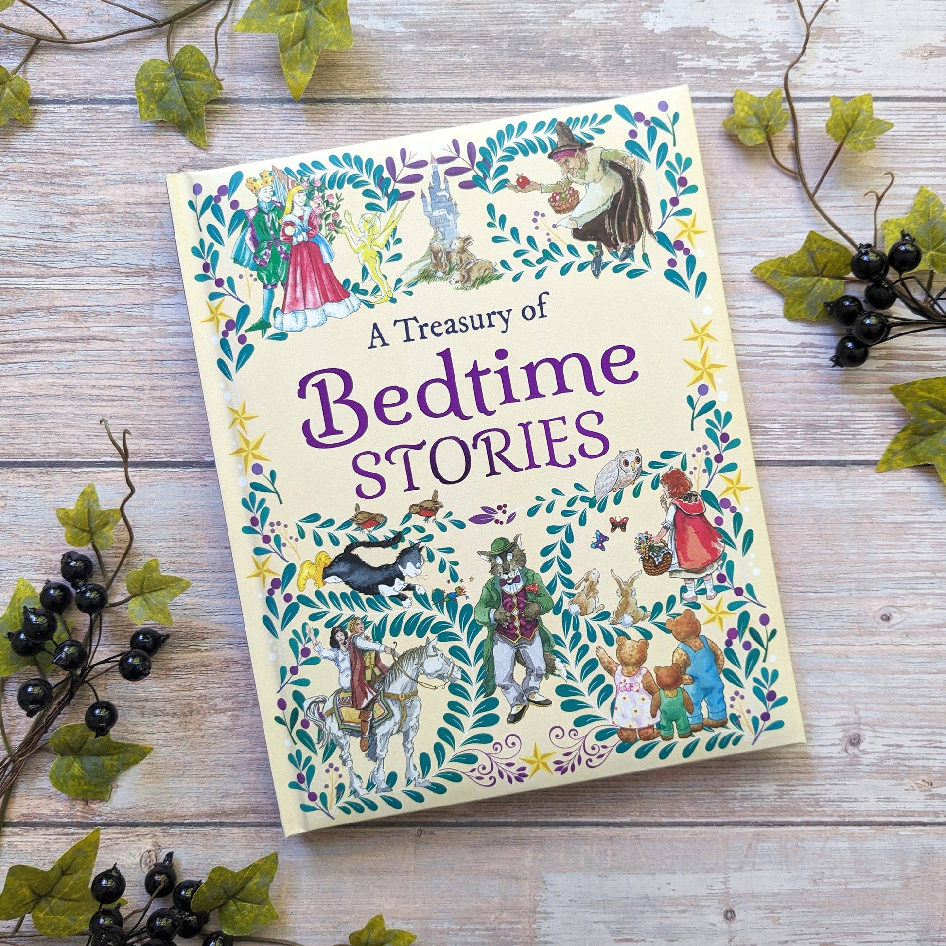 Book titled 'A Treasury of Bedtime Stories' on a wooden surface with decorative elements.