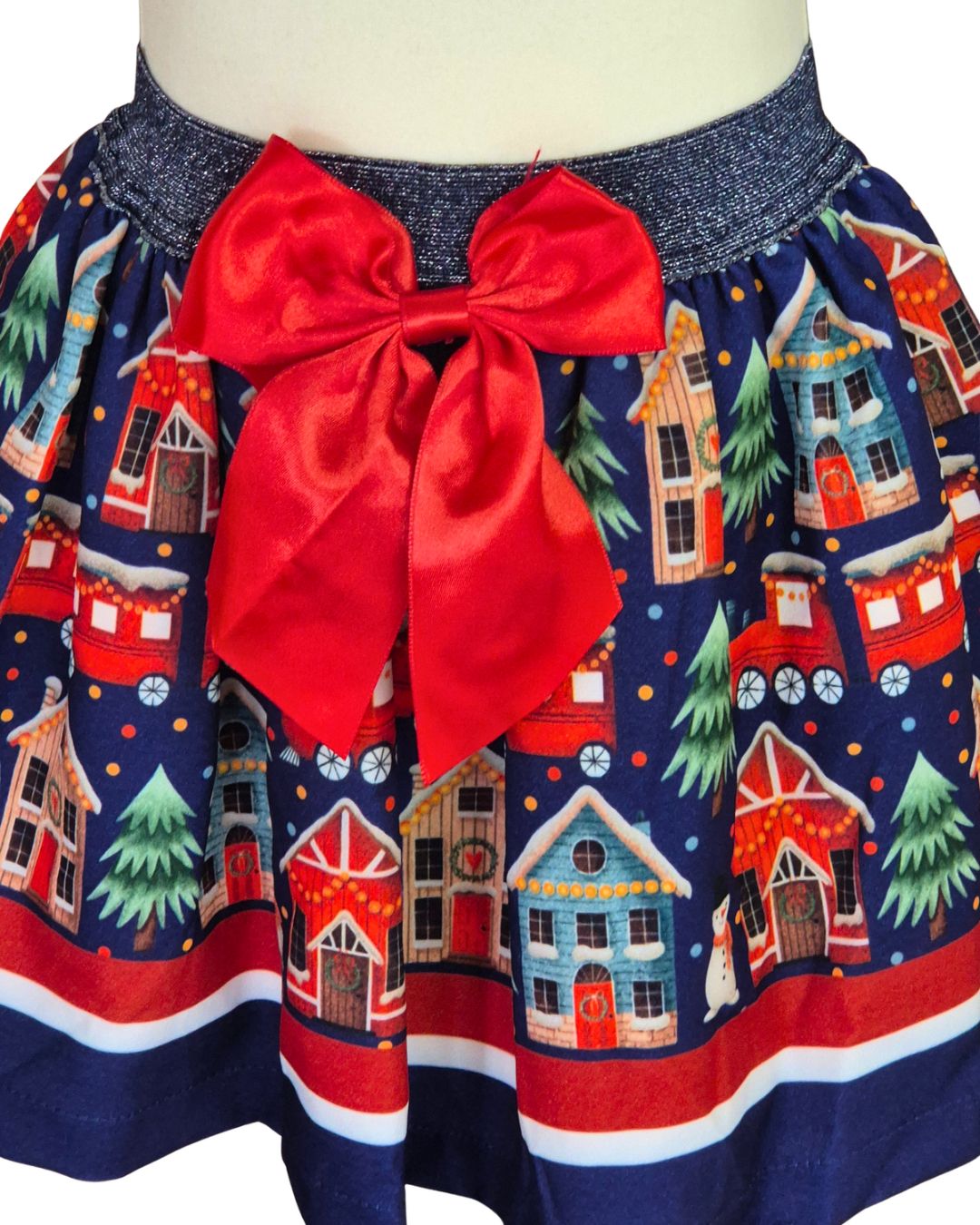 Girls’ Christmas village skirt set with red satin bow