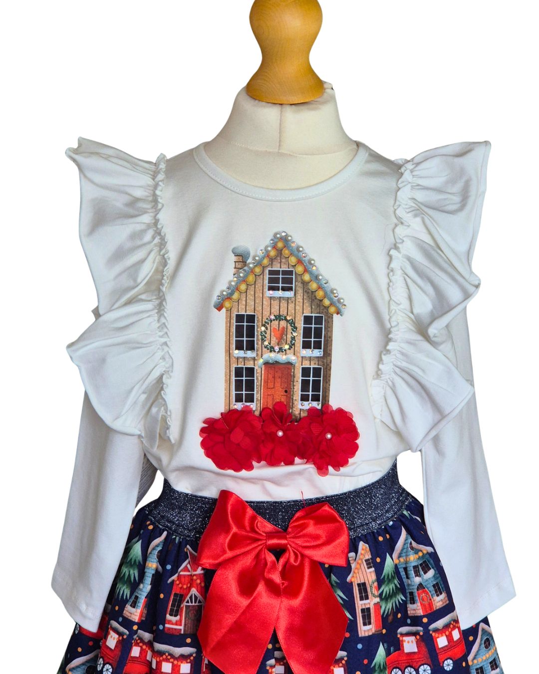 Girls’ gingerbread house top with festive printed skirt